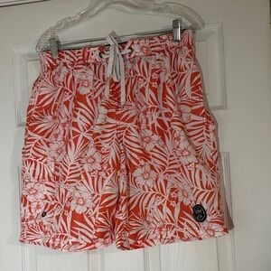 Men’s Exist swim trunks.